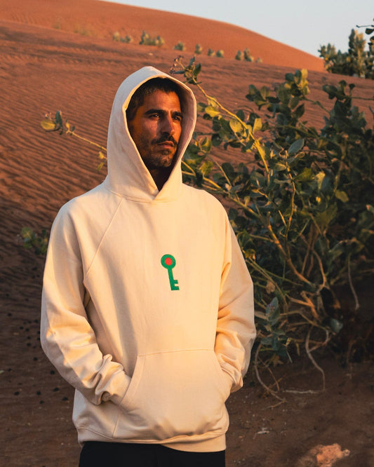 Key of Return Hoodie in black — back view, outdoor lifestyle — FALASTIN
