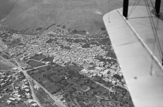 Aerial view of Nablus sitting in the valley between Mount Ebal and Mount Gerizim, 1937