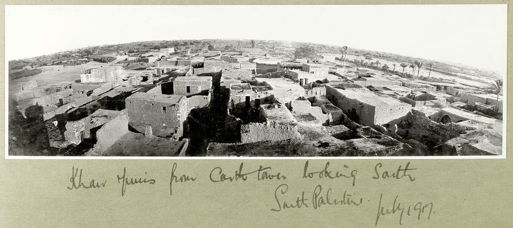 Khan Yunis photographed from the tower of its Mamluk castle in July 1917, flat-roofed houses and palm trees spreading out across the southern coastal plain