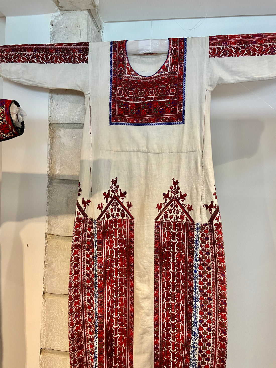 Palestinian wedding celebration with traditional embroidered dress