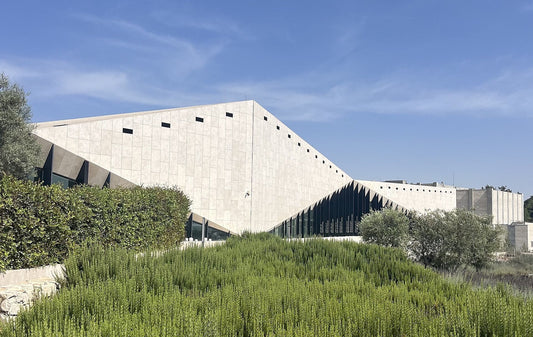 The modern stone building of the Palestinian Museum in Birzeit, dedicated to telling Palestinian history and culture