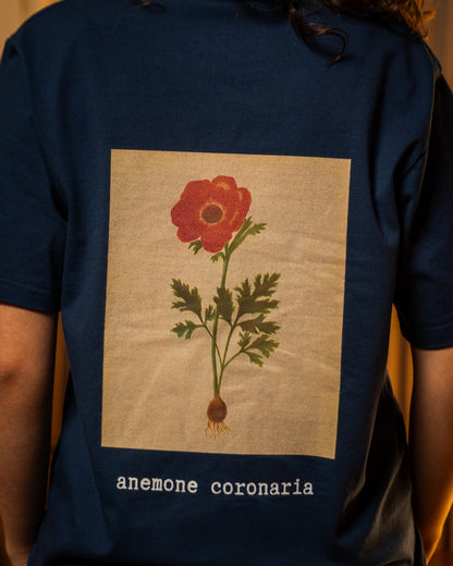 Poppy Flower T-Shirt — model wearing Blue, back view