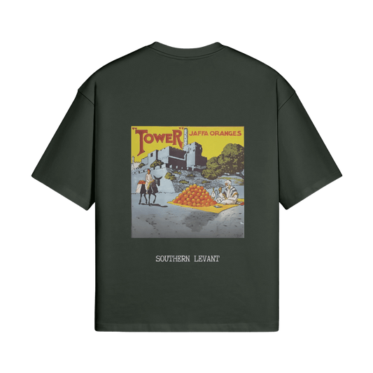 Mockup image of the Jaffa Orange T-Shirt in forest from FALASTIN. The back design showcases a vintage-inspired illustration featuring Jaffa oranges, symbolizing the rich agricultural heritage of Palestine. The text ‘Southern Levant’ reinforces the historical and geographical significance, all set against a transparent background.